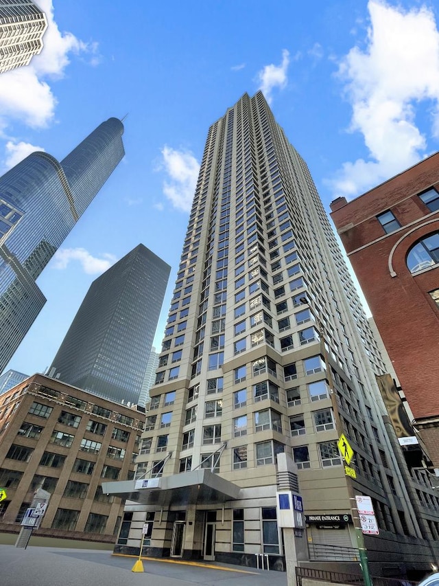 view of building exterior featuring a view of city