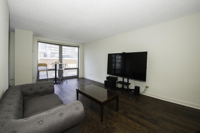 440 N Wabash Ave Unit 1007, Chicago, IL 60611 - living room featuring a textured ceiling, baseboards, and wood finished floors
