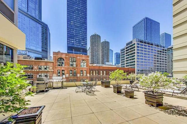 440 N Wabash Ave Unit 1007, Chicago, IL 60611 - view of patio with a city view