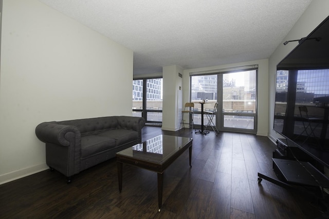 440 N Wabash Ave Unit 1007, Chicago, IL 60611 - living room featuring a textured ceiling, dark wood-style flooring, and baseboards