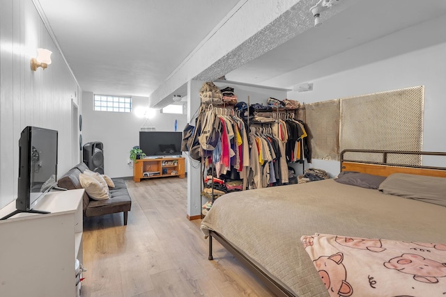 bedroom with light wood-type flooring