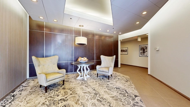 living area featuring light tile patterned floors