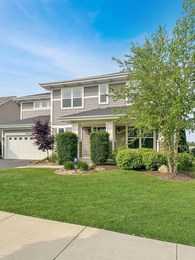 885 Simpson Ave, Elburn, IL 60119 - view of front of house with a garage, a front lawn, and asphalt driveway