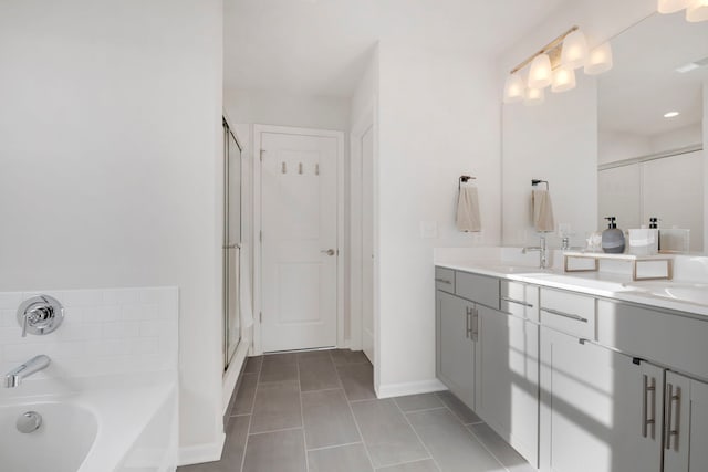 885 Simpson Ave, Elburn, IL 60119 - full bath featuring double vanity, a bath, a shower stall, tile patterned flooring, and baseboards
