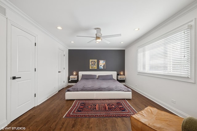 bedroom featuring dark wood-style floors, ornamental molding, and baseboards