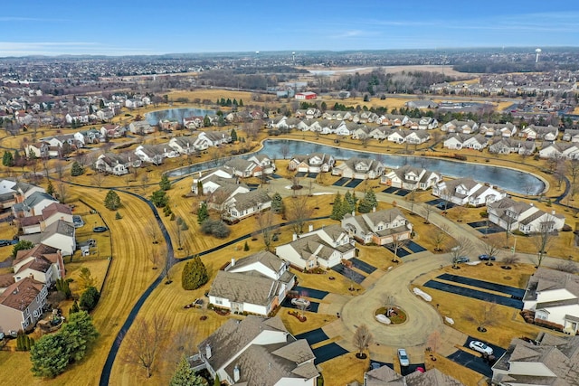 birds eye view of property with a residential view