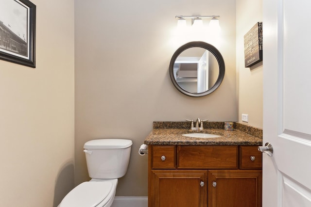 half bath with toilet and vanity