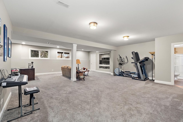 exercise room with carpet floors, recessed lighting, visible vents, and baseboards