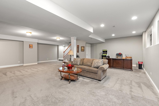 living room with recessed lighting, light colored carpet, baseboards, and stairs