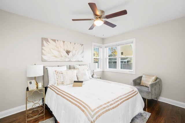 bedroom featuring dark hardwood / wood-style floors and ceiling fan