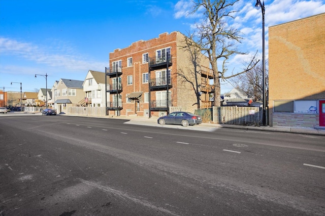 view of building exterior with a residential view