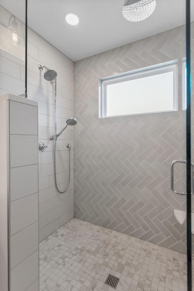 bathroom with a shower stall