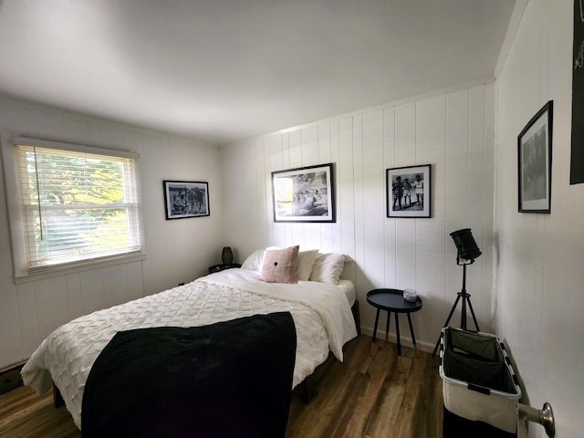 bedroom featuring dark hardwood / wood-style floors