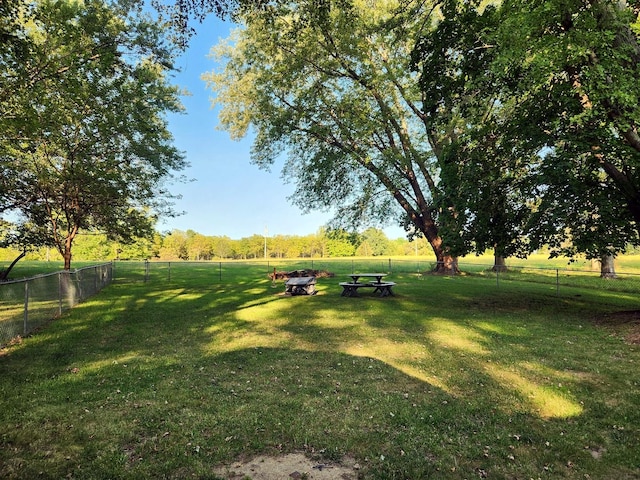 view of yard with a rural view