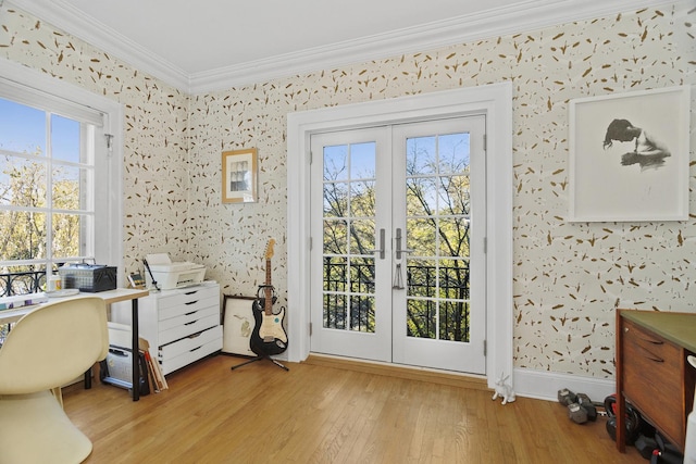 office area featuring light wood-style flooring, baseboards, ornamental molding, french doors, and wallpapered walls