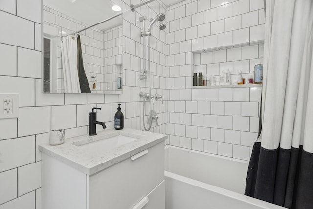 bathroom featuring tile walls, backsplash, shower / tub combo with curtain, and vanity