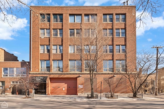 view of building exterior featuring a garage