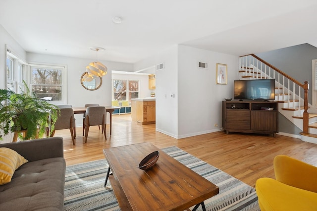 living room featuring light wood-type flooring