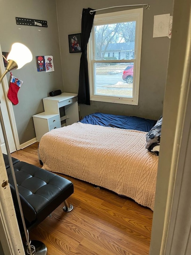 bedroom featuring light wood-type flooring