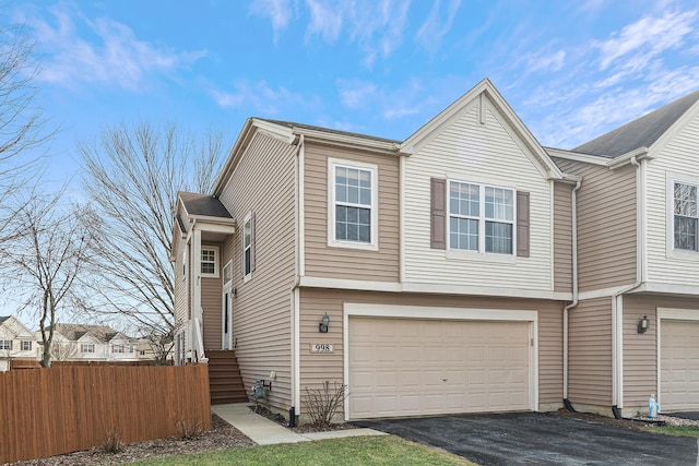 view of property exterior with a garage