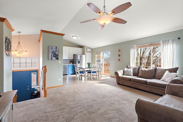 living room featuring ceiling fan, light colored carpet, and lofted ceiling