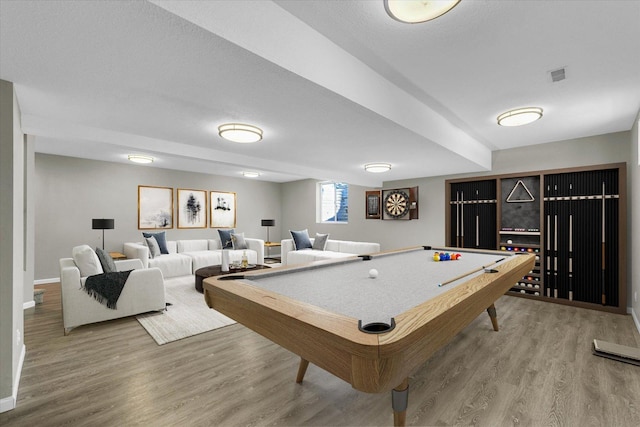 game room featuring billiards, wood finished floors, visible vents, and baseboards