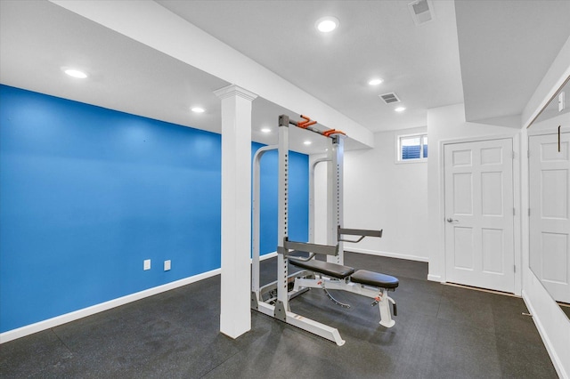 workout area featuring visible vents, baseboards, and recessed lighting