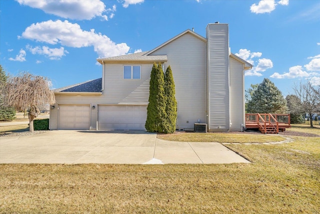 view of side of property featuring concrete driveway, a chimney, a wooden deck, and central AC unit