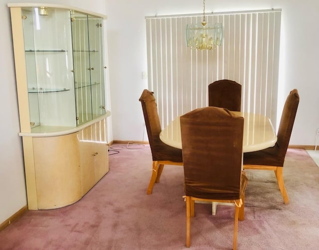 3469 W 155th St, Markham, IL 60428 - dining room with baseboards, a notable chandelier, and carpet