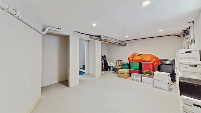 finished basement featuring recessed lighting