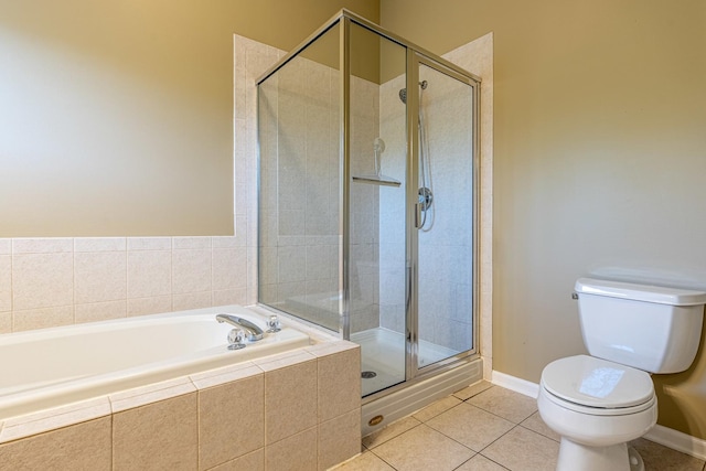 6074 Ironwood Ln, Lisle, IL 60532 - full bath featuring toilet, a stall shower, tile patterned flooring, a bath, and baseboards