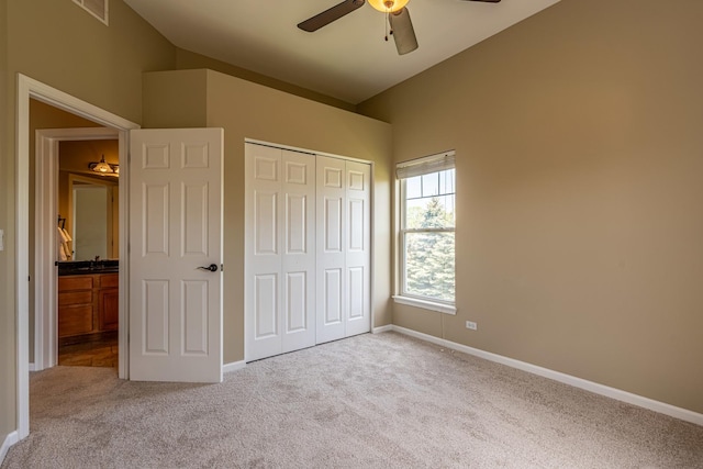 6074 Ironwood Ln, Lisle, IL 60532 - unfurnished bedroom featuring carpet, vaulted ceiling, a closet, and baseboards
