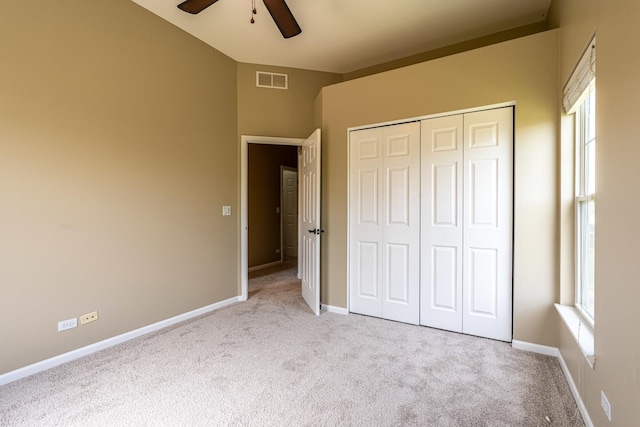 6074 Ironwood Ln, Lisle, IL 60532 - unfurnished bedroom with carpet flooring, multiple windows, a closet, and baseboards