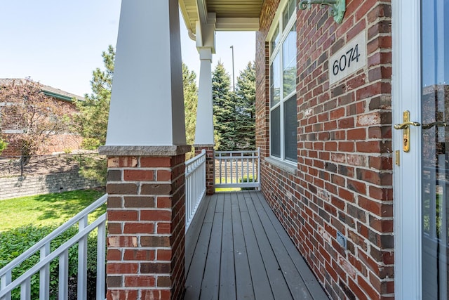 6074 Ironwood Ln, Lisle, IL 60532 - wooden deck with covered porch