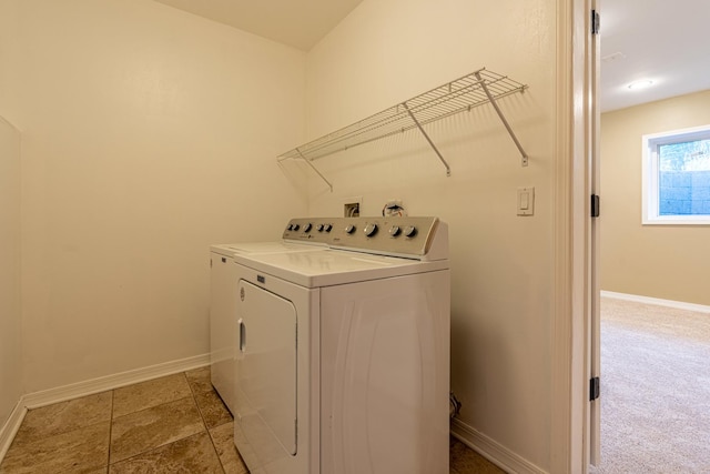 6074 Ironwood Ln, Lisle, IL 60532 - laundry area featuring washing machine and clothes dryer and baseboards