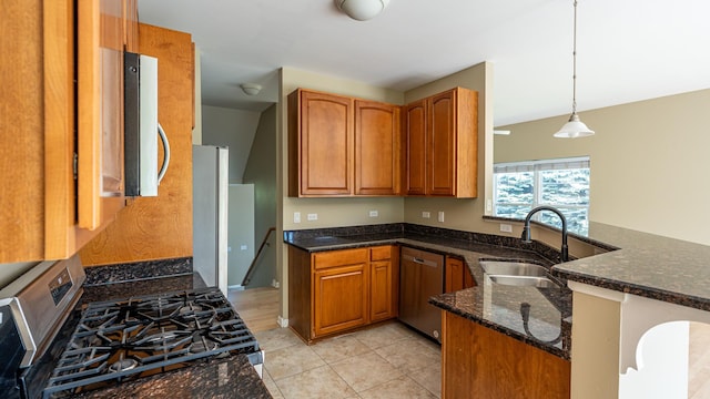 6074 Ironwood Ln, Lisle, IL 60532 - kitchen featuring appliances with stainless steel finishes, a sink, a peninsula, and brown cabinets