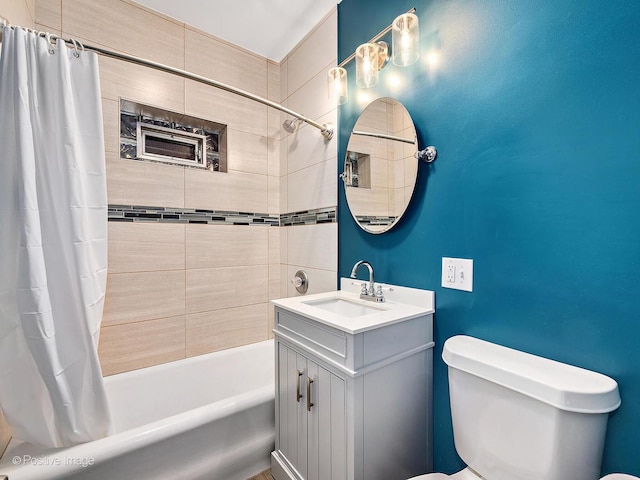 bathroom with toilet, shower / bath combo, and vanity