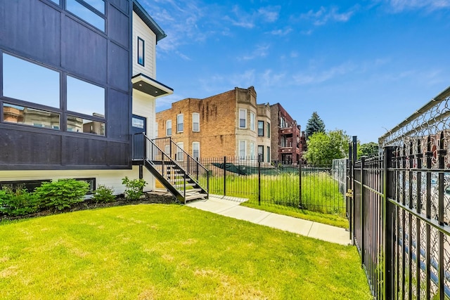 view of home's community featuring a yard