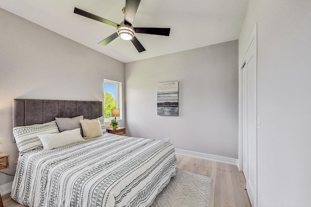 bedroom featuring ceiling fan and light wood-type flooring