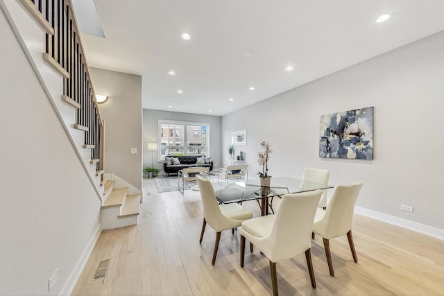 dining room featuring light hardwood / wood-style floors