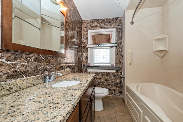 full bath with tile walls, shower / bathtub combination, decorative backsplash, toilet, and vanity