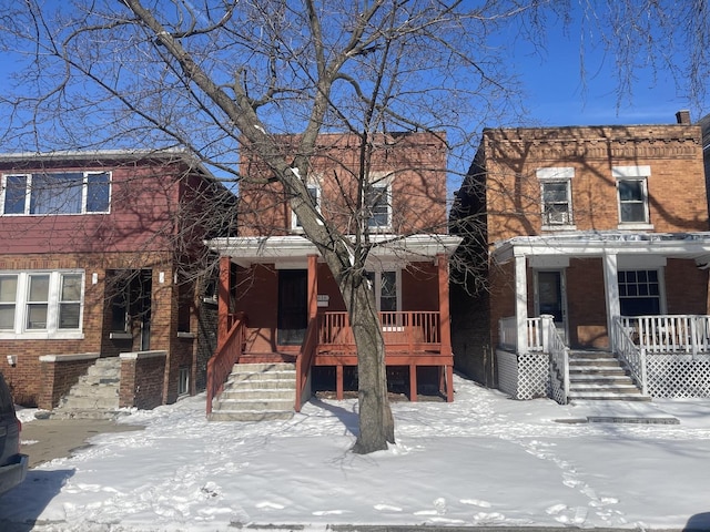 view of front of property featuring covered porch