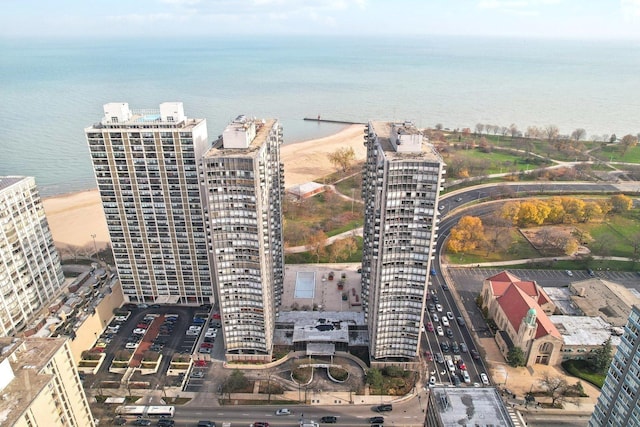 aerial view featuring a water view and a view of city