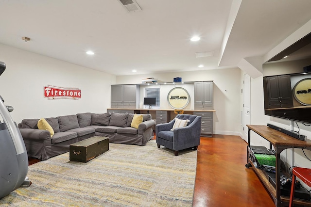 living room with baseboards, finished concrete floors, visible vents, and recessed lighting