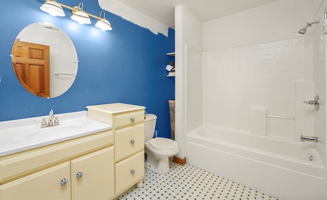 bathroom featuring toilet,  shower combination, and vanity