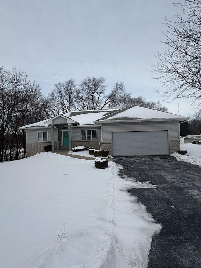 single story home with a garage