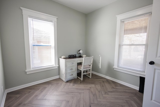 home office featuring light parquet floors