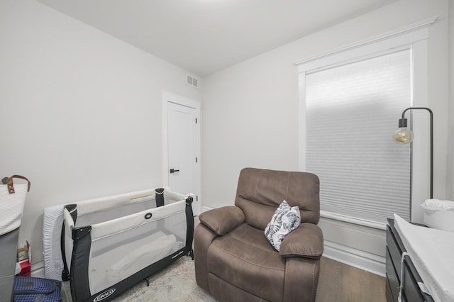 sitting room with light hardwood / wood-style floors