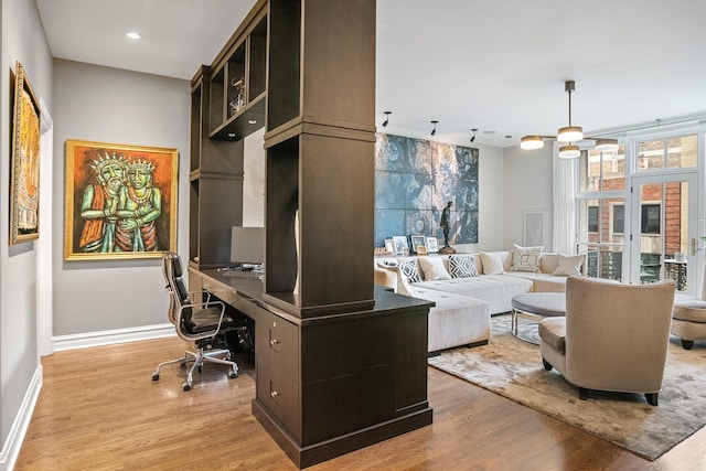 office area with light wood finished floors, baseboards, french doors, and recessed lighting