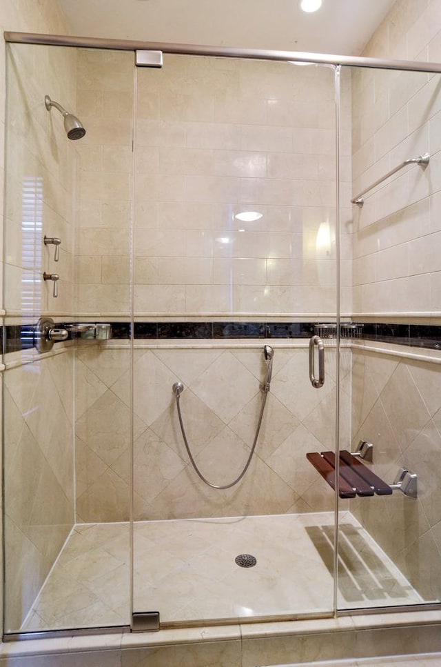 full bathroom with a stall shower